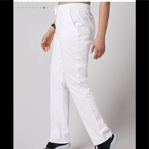 White scrub skinny pants.